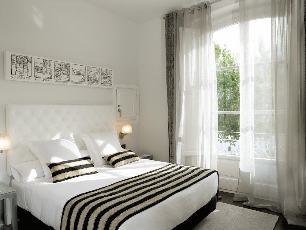 Foto de una habitación de Hotel Villa Paulita