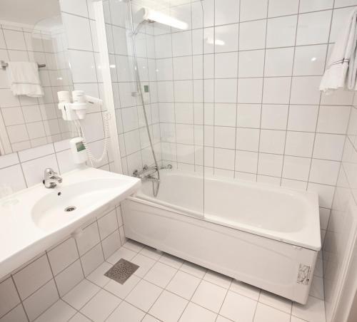 Foto del baño de Hotel Highland Lodge