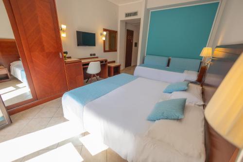 Foto de una habitación de Hotel Le Palme