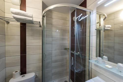 Foto del baño de Carline Hotel