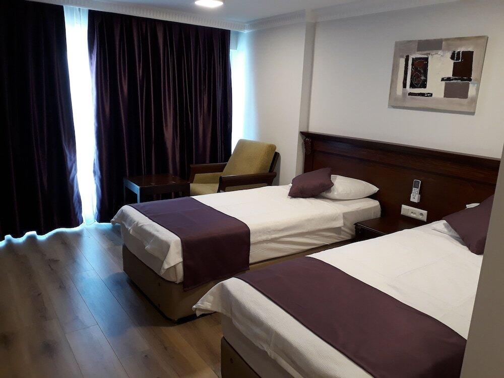 Foto de una habitación de Alkan Hotel