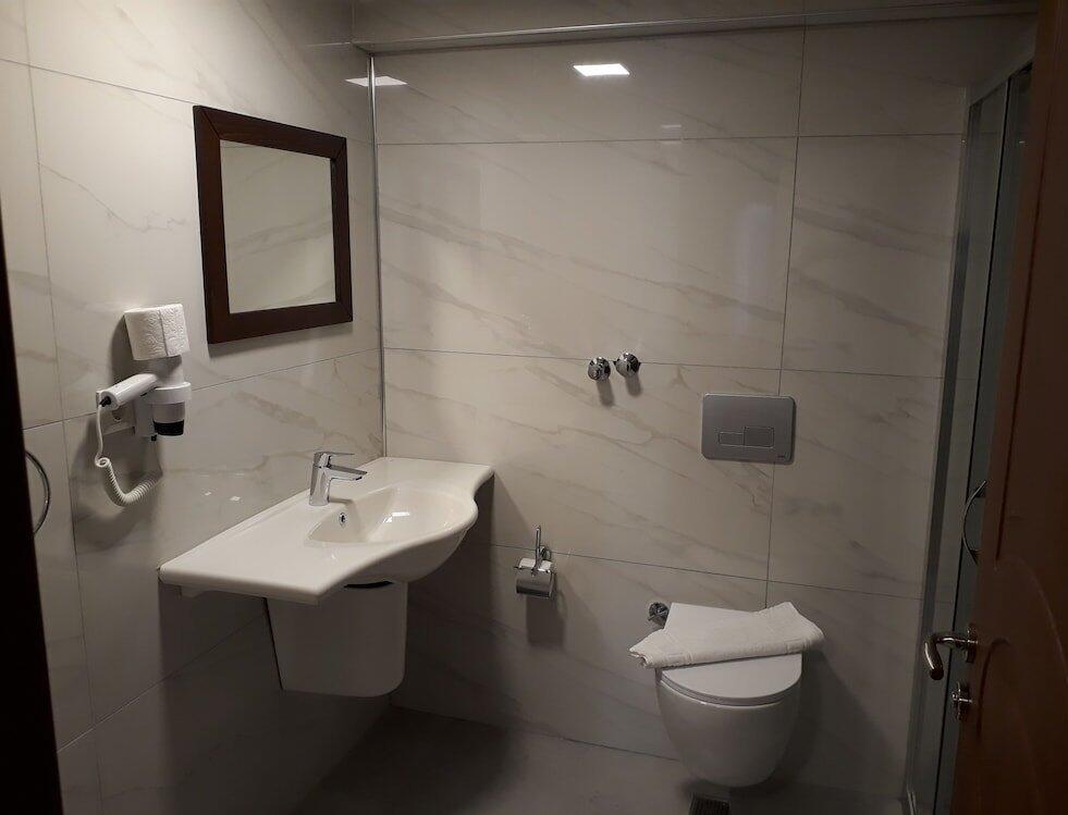 Foto del baño de Alkan Hotel