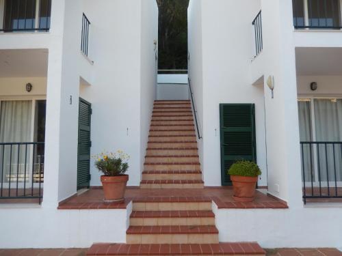 Foto de una habitación de Apartamentos Alta Galdana Playa