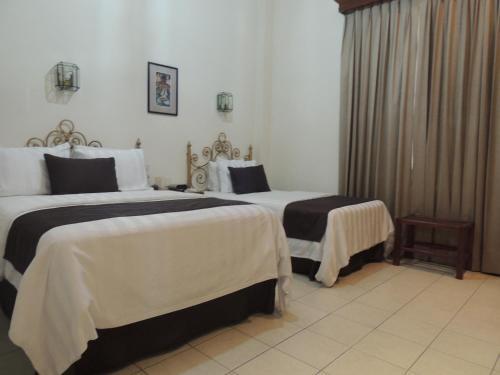 Foto de una habitación de Hotel Concierge Plaza Colima
