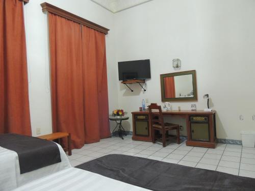 Foto de una habitación de Hotel Concierge Plaza Colima
