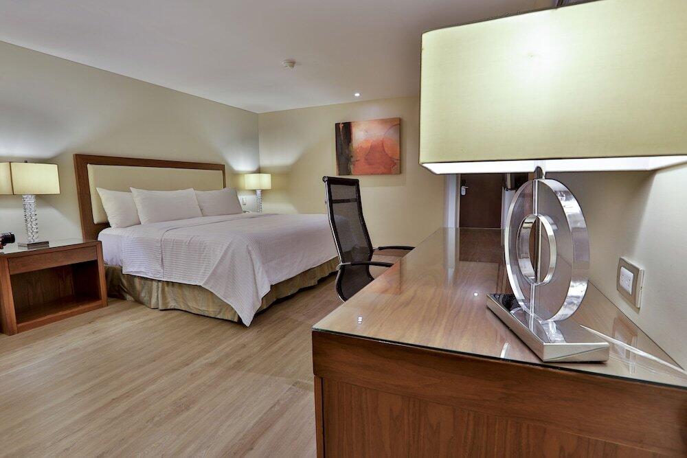 Foto de una habitación de Hotel Antaris Valle