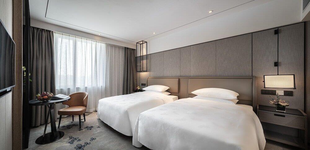 Foto de una habitación de Hotel Landmark Canton