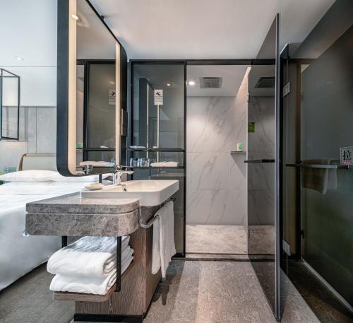 Foto del baño de Hotel Landmark Canton