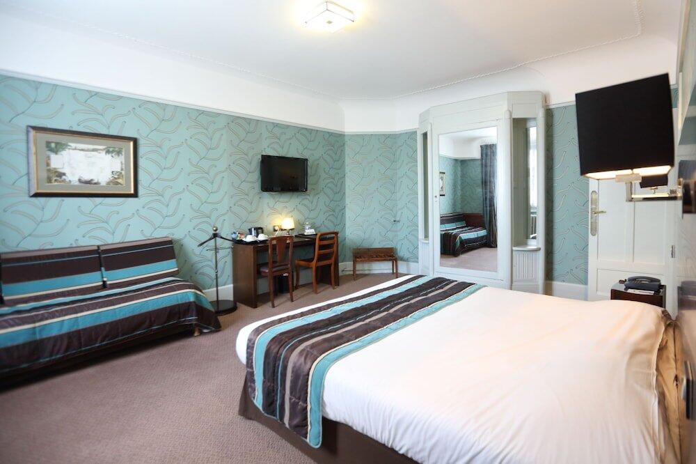 Foto de una habitación de Le Grand Hotel