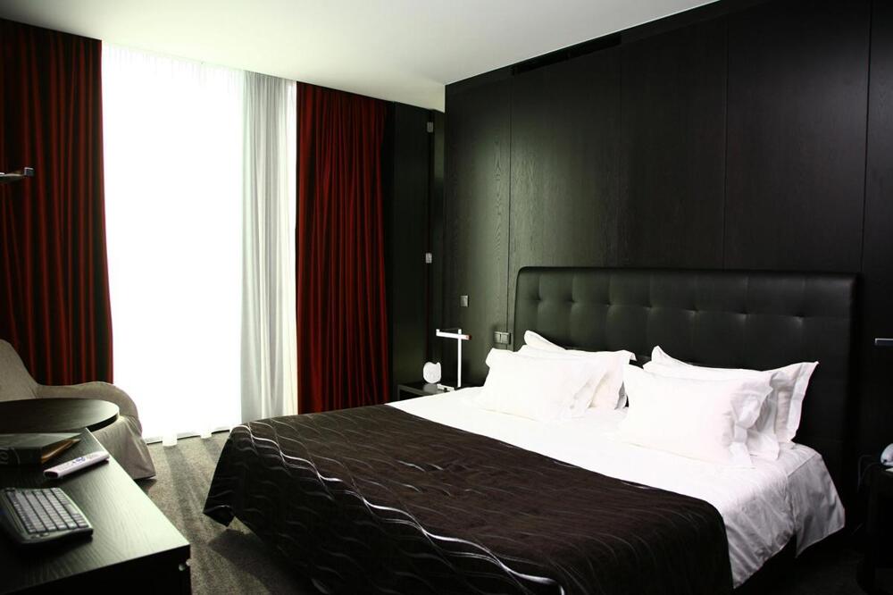 Foto de una habitación de Axis Viana Business &amp;amp; SPA Hotel