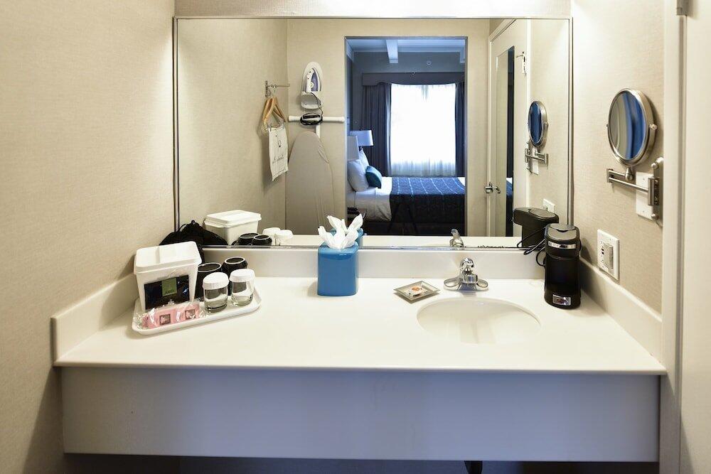 Foto del baño de Hotel City Center Inn &amp;amp; Suites