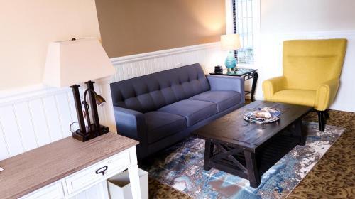 Foto de una habitación de Hotel City Center Inn &amp;amp; Suites
