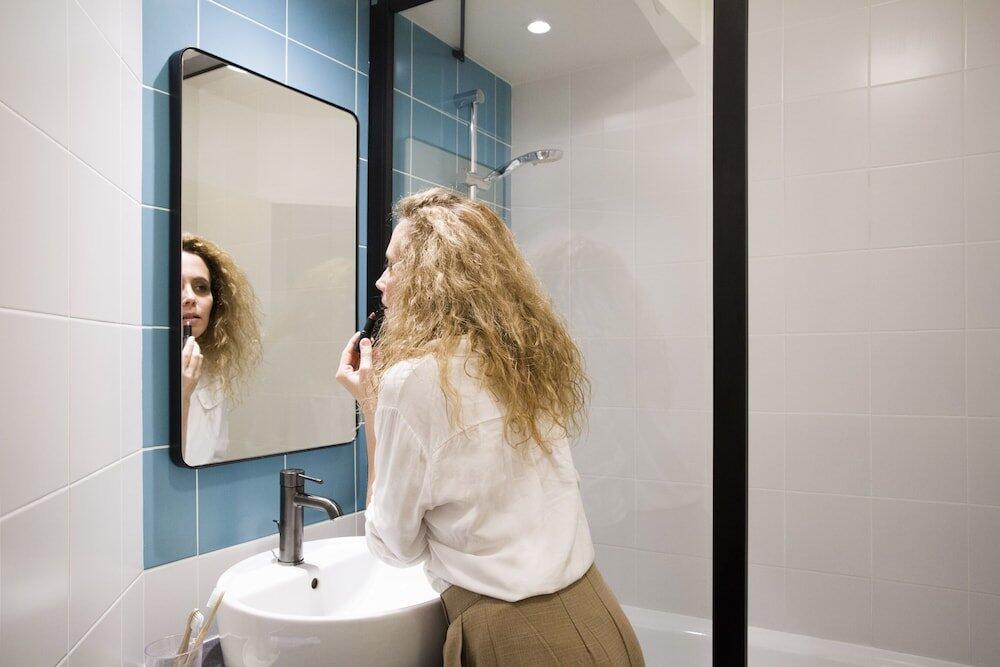 Foto del baño de Aparthotel Adagio Porte de Versailles