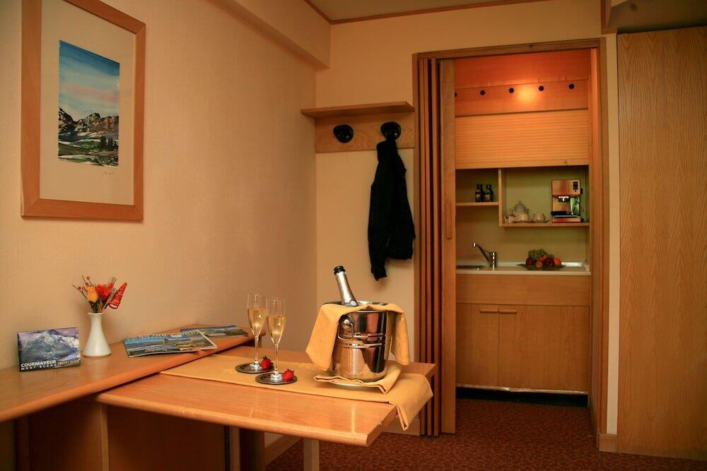 Foto de una habitación de Hotel Les Jumeaux Courmayeur