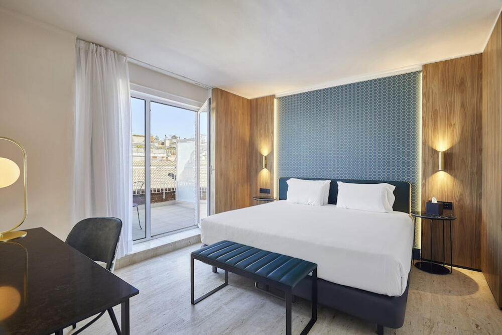 Foto de una habitación de Hotel Exe Mitre