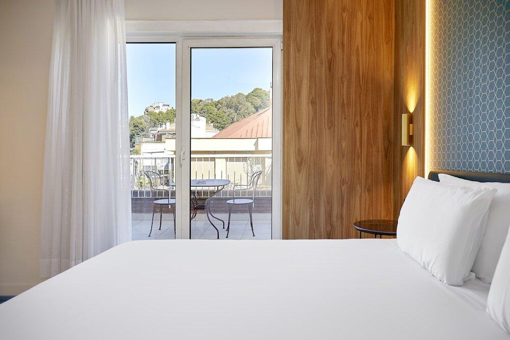 Foto de una habitación de Hotel Exe Mitre