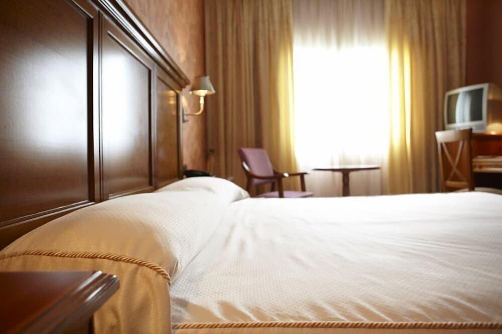 Foto de una habitación de HOTEL CORAZON DEL JERTE