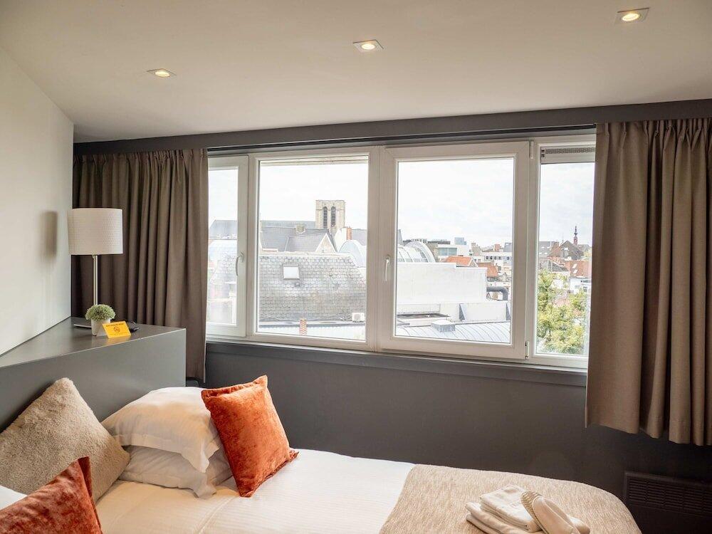 Foto de una habitación de Hotel Gravensteen