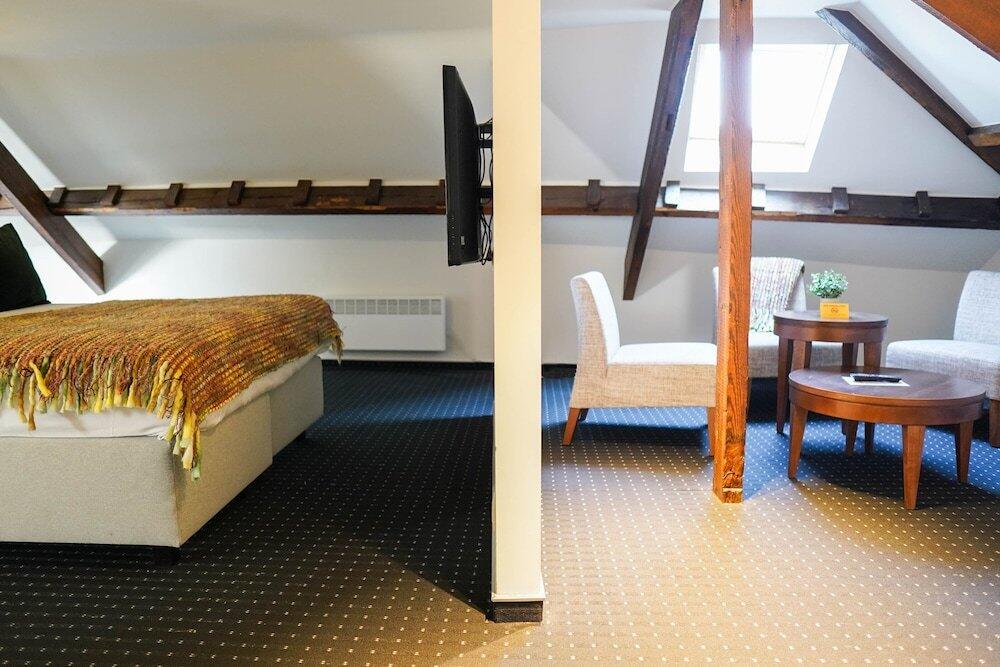 Foto de una habitación de Hotel Gravensteen