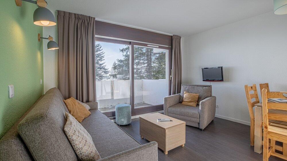 Foto de una habitación de Aparthotel Madame Vacances Les Terrasses De Véret