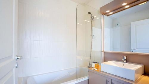 Foto del baño de Aparthotel Madame Vacances Les Terrasses De Véret
