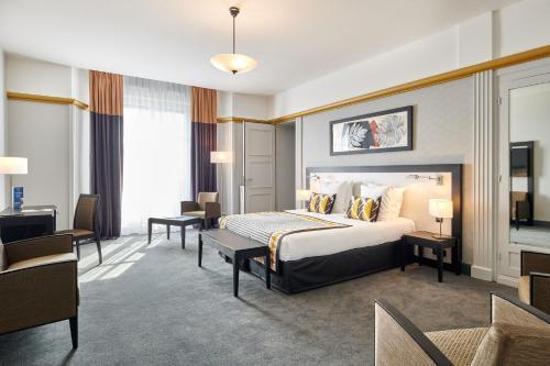Foto de una habitación de Hotel &amp;amp; Spa Vacances Bleues Le Splendid