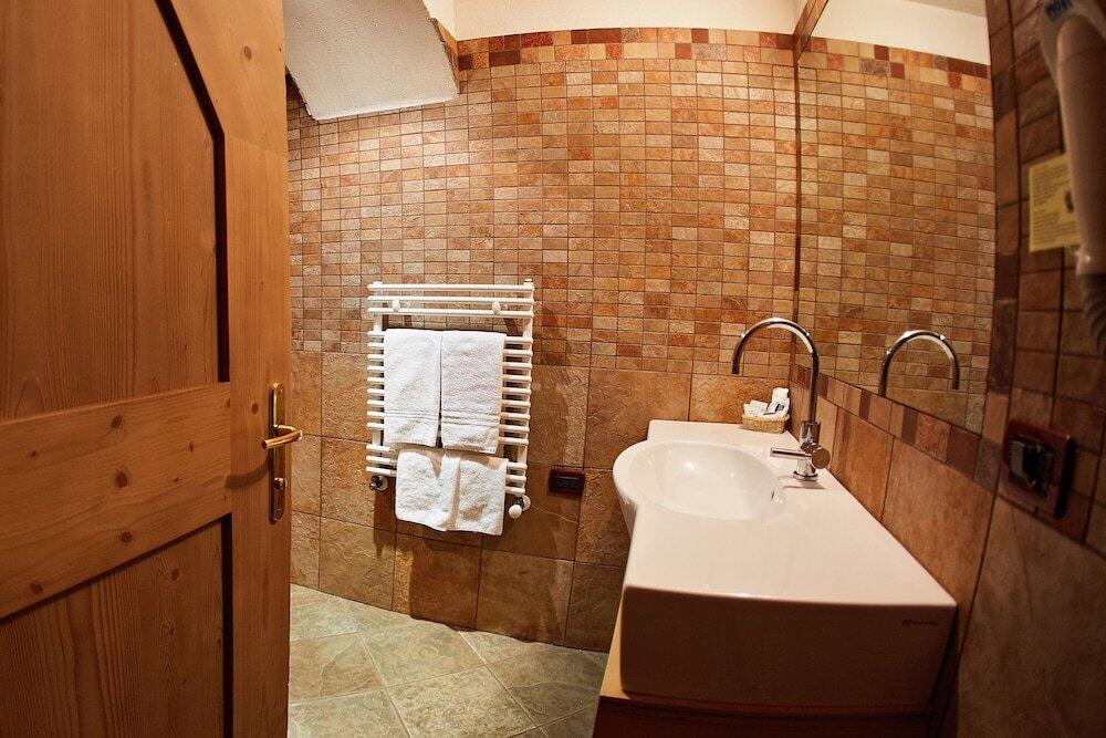 Foto del baño de GH Hotel Monzoni