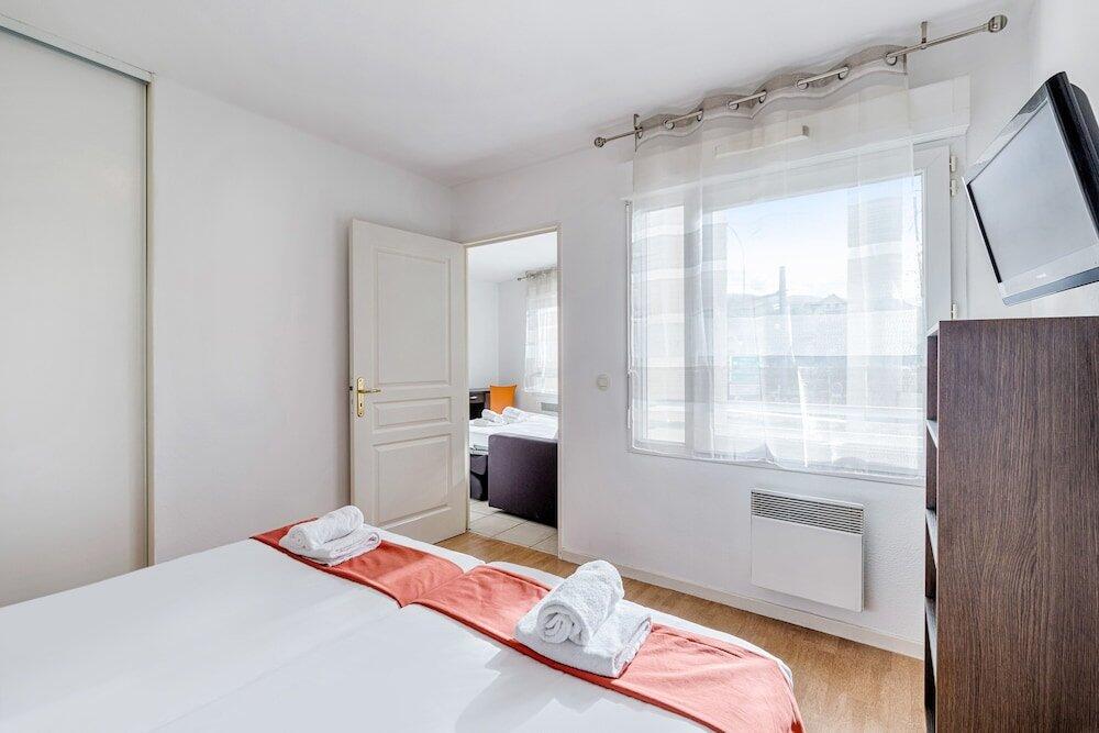 Foto de una habitación de Appart&amp;#039;City Classic Thonon les bains