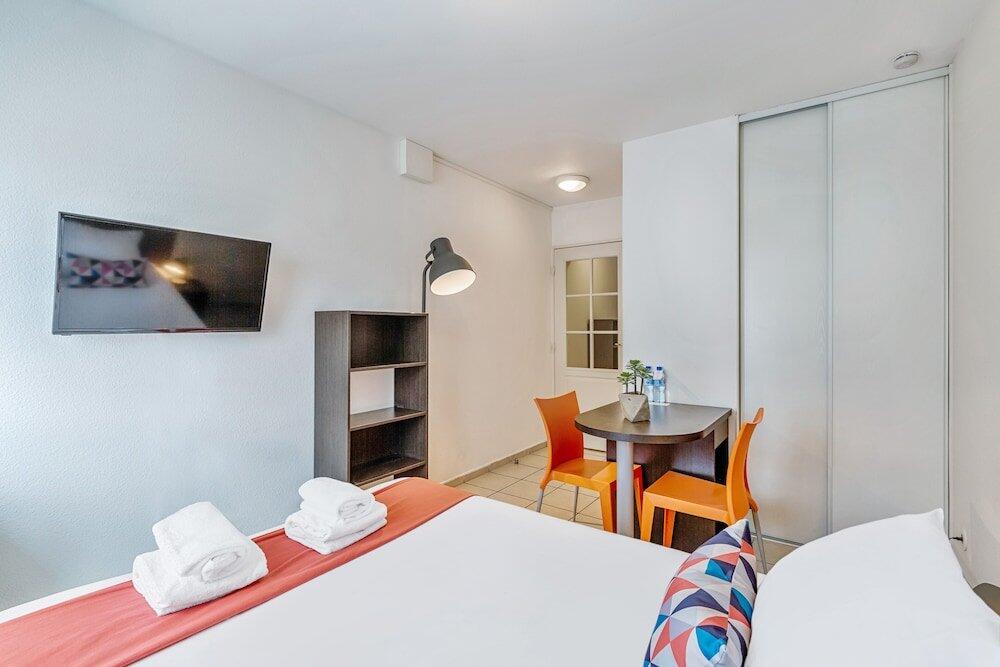 Foto de una habitación de Appart&amp;#039;City Classic Thonon les bains