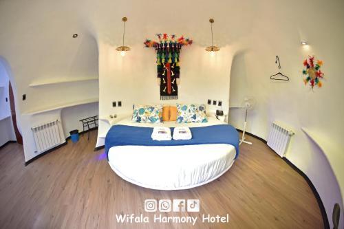 Foto de una habitación de Wifala Harmony Hotel
