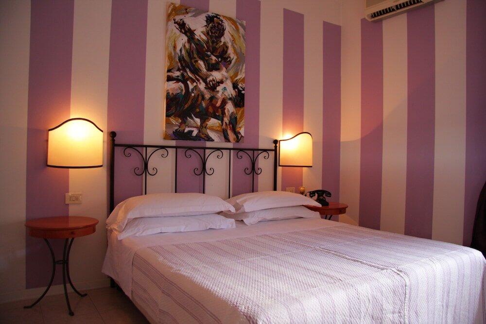 Foto de una habitación de Hotel Alex