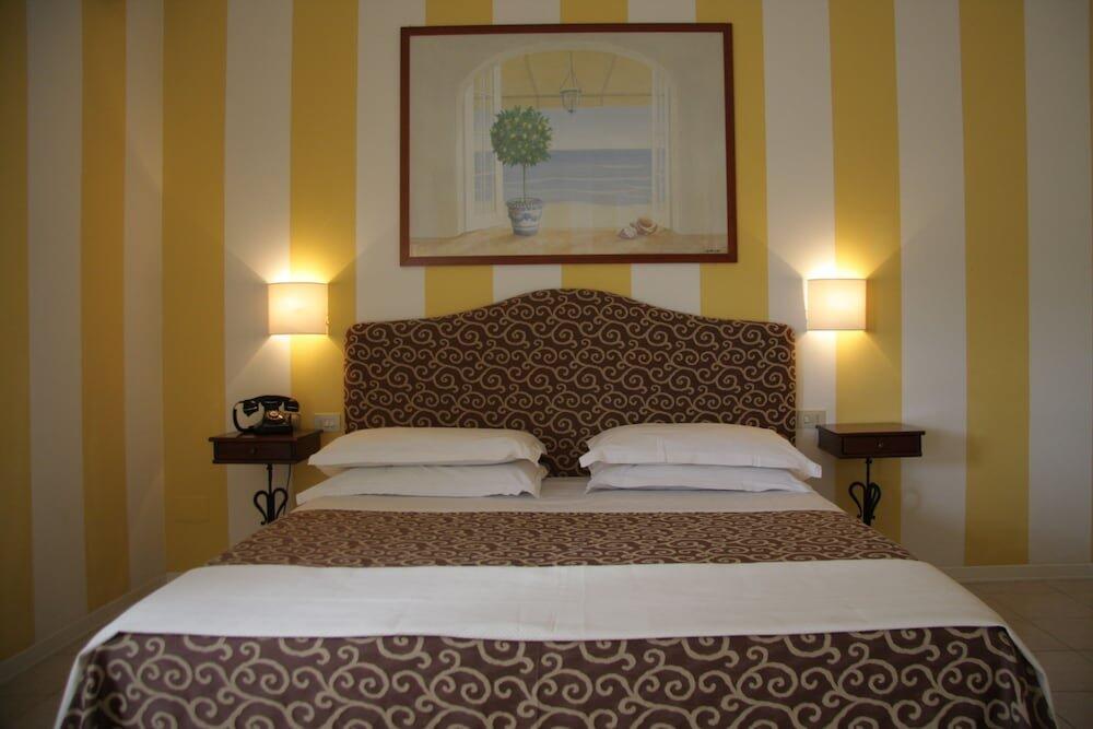 Foto de una habitación de Hotel Alex