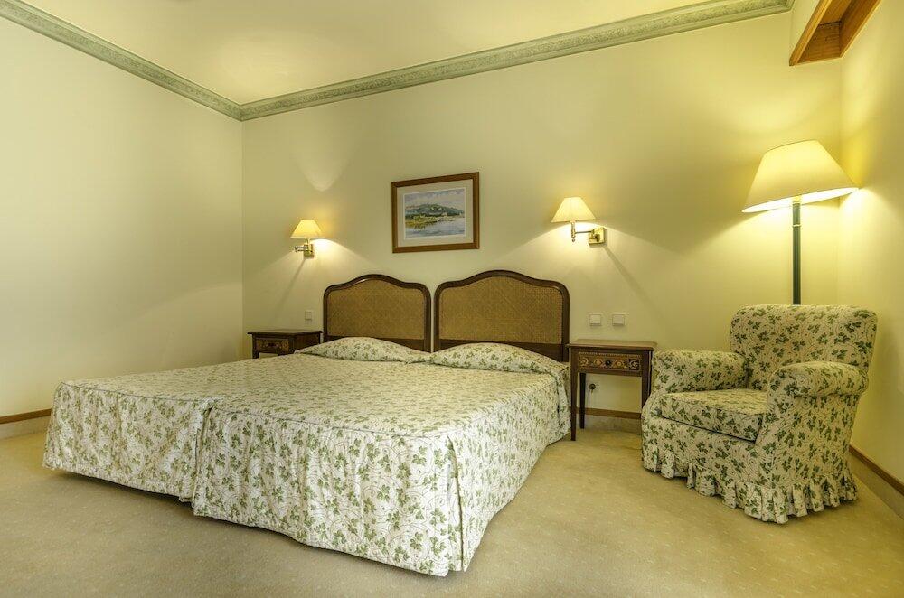 Foto de una habitación de Hotel Solar Palmeiras