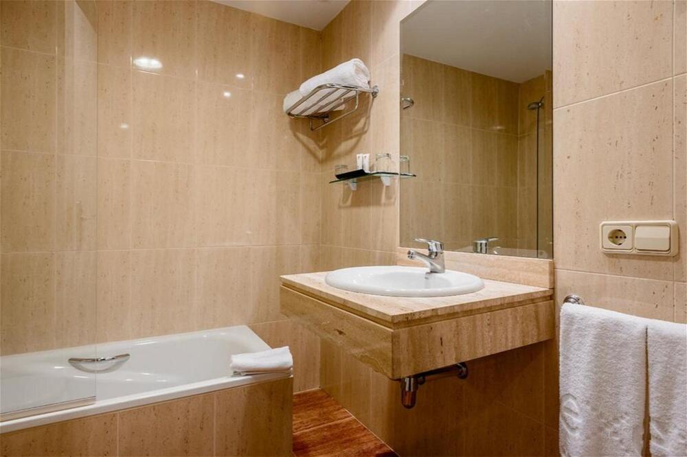 Foto del baño de Hotel Ikonik Plaza Mercado