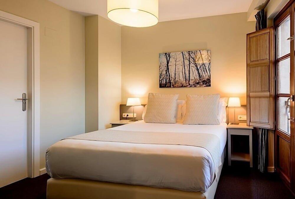 Foto de una habitación de Hotel Ikonik Plaza Mercado