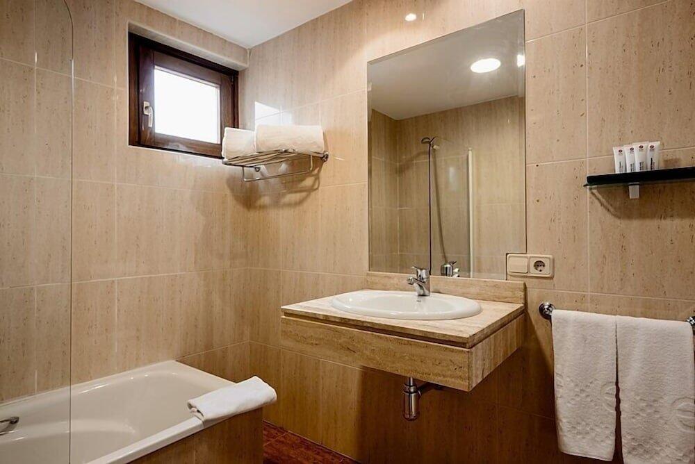 Foto del baño de Hotel Ikonik Plaza Mercado