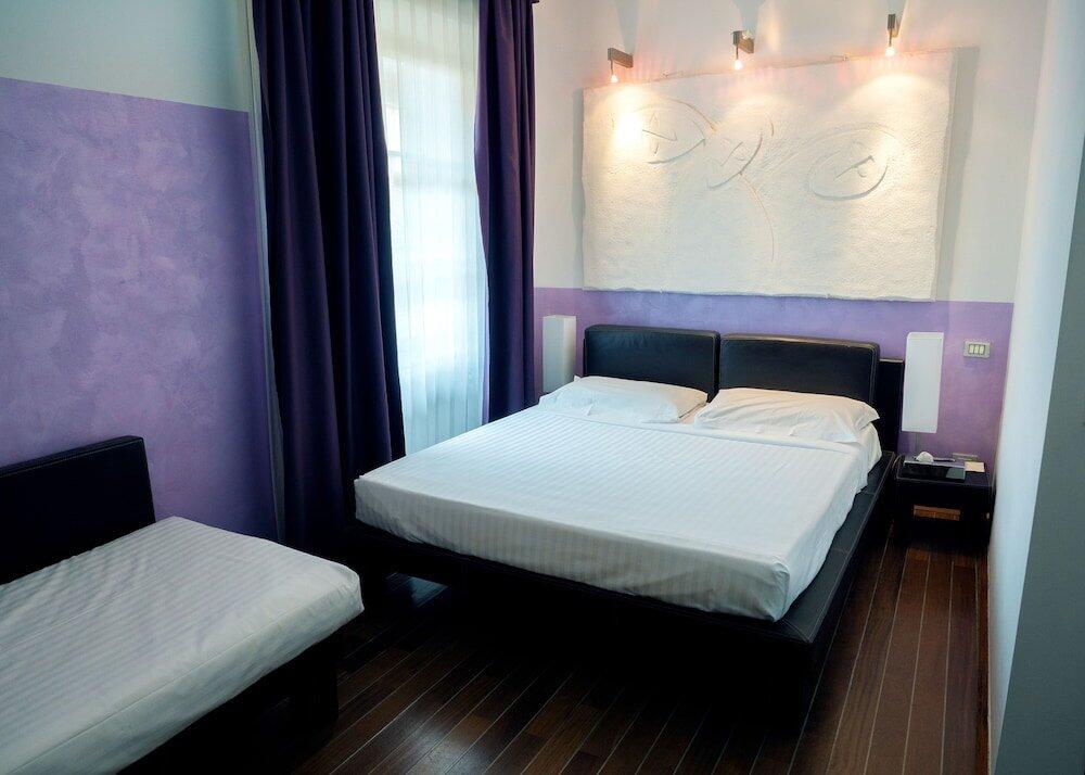 Foto de una habitación de Borghese Palace Art Hotel