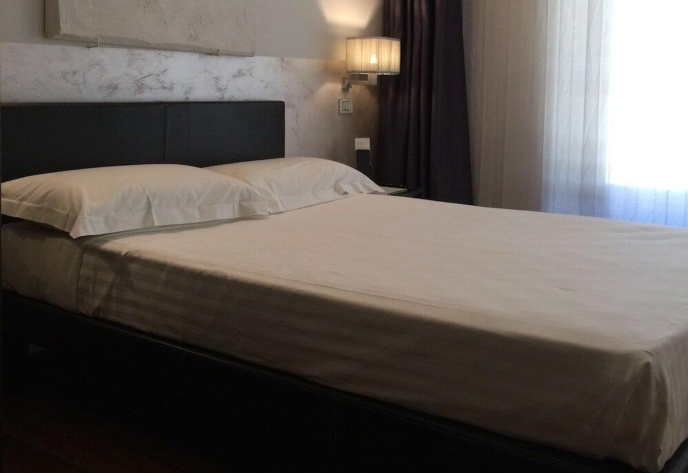 Foto de una habitación de Borghese Palace Art Hotel