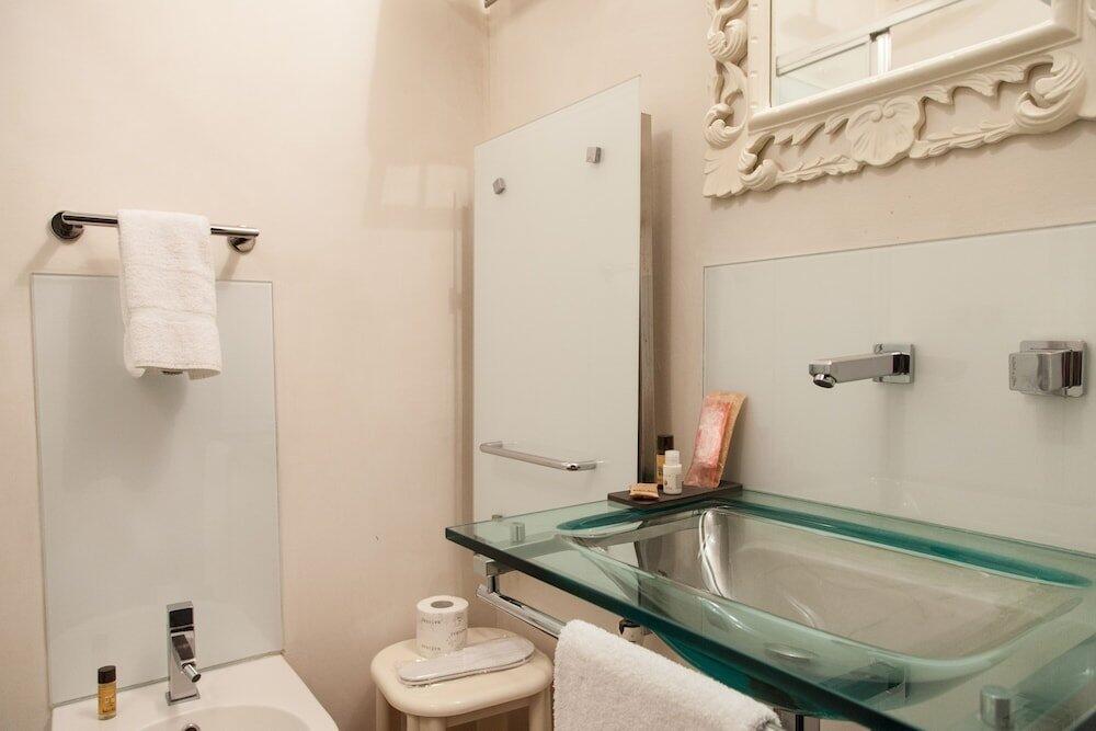 Foto del baño de Borghese Palace Art Hotel
