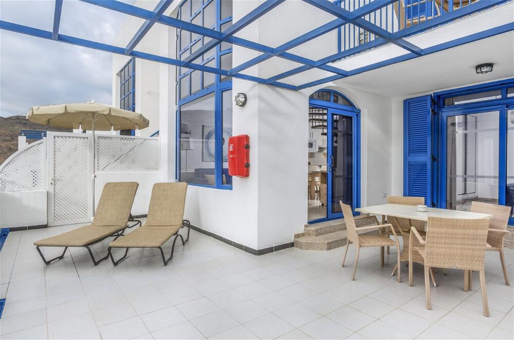 Foto de una habitación de Aparthotel Club Cala Blanca