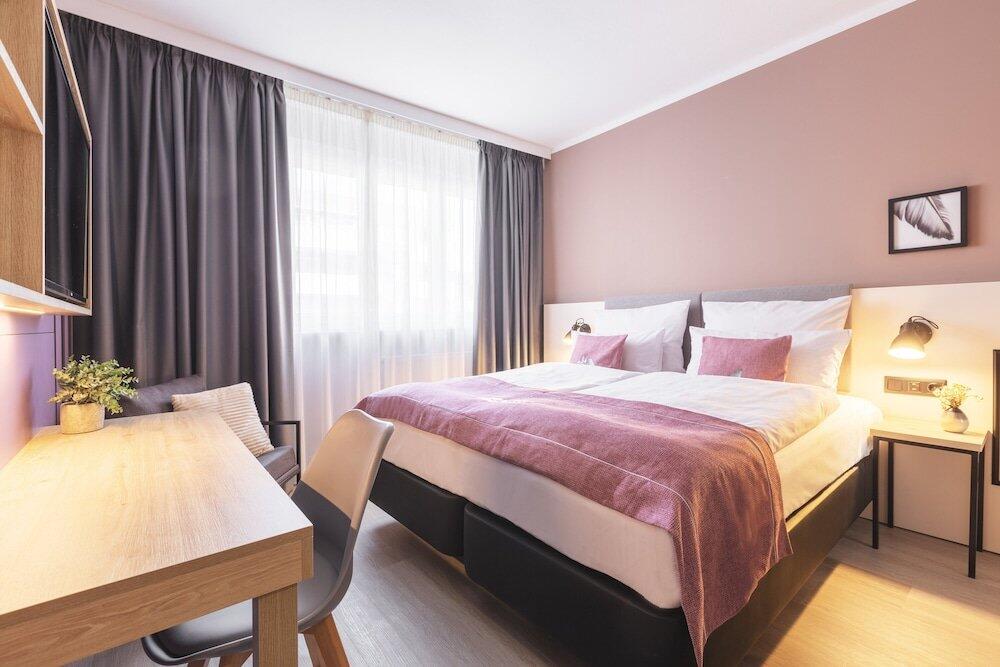 Foto de una habitación de Novum Hotel Lichtburg am Kurfürstendamm