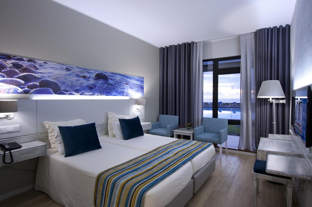 Foto de una habitación de Hotel Estalagem do Mar