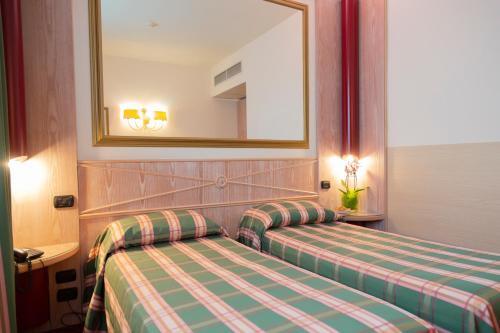 Foto de una habitación de iH Hotels Milano St. John