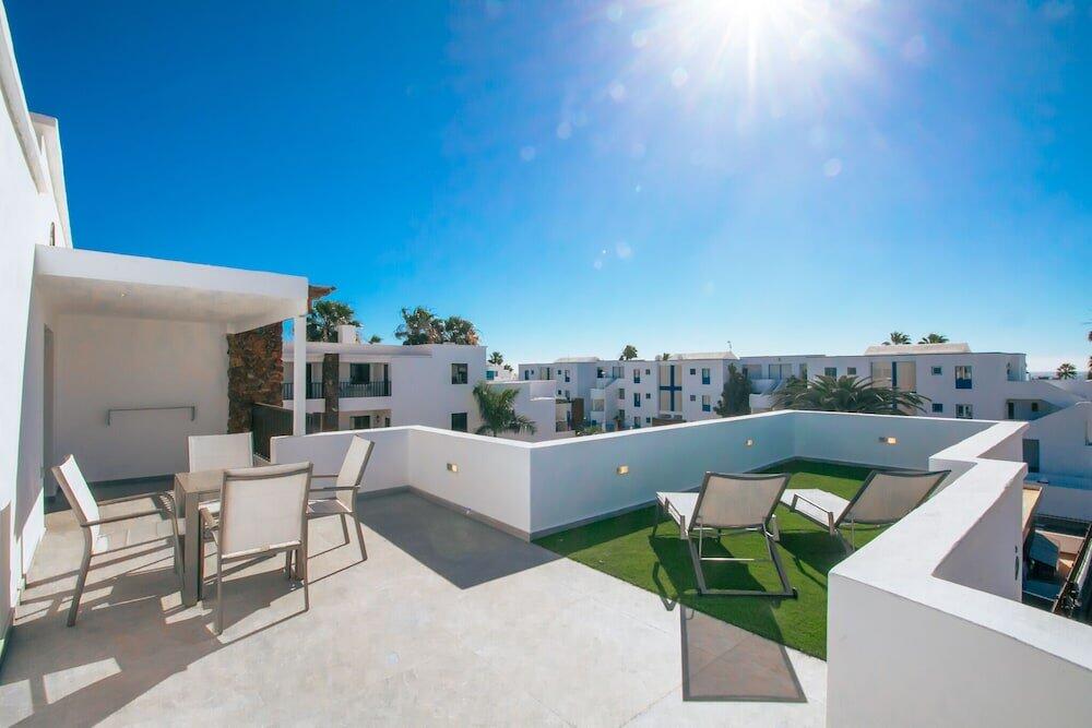 Foto de una habitación de Apartamentos Club Atlántico