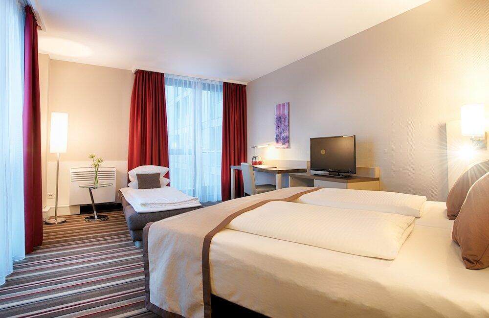 Foto de una habitación de Leonardo Hotel Hannover Airport