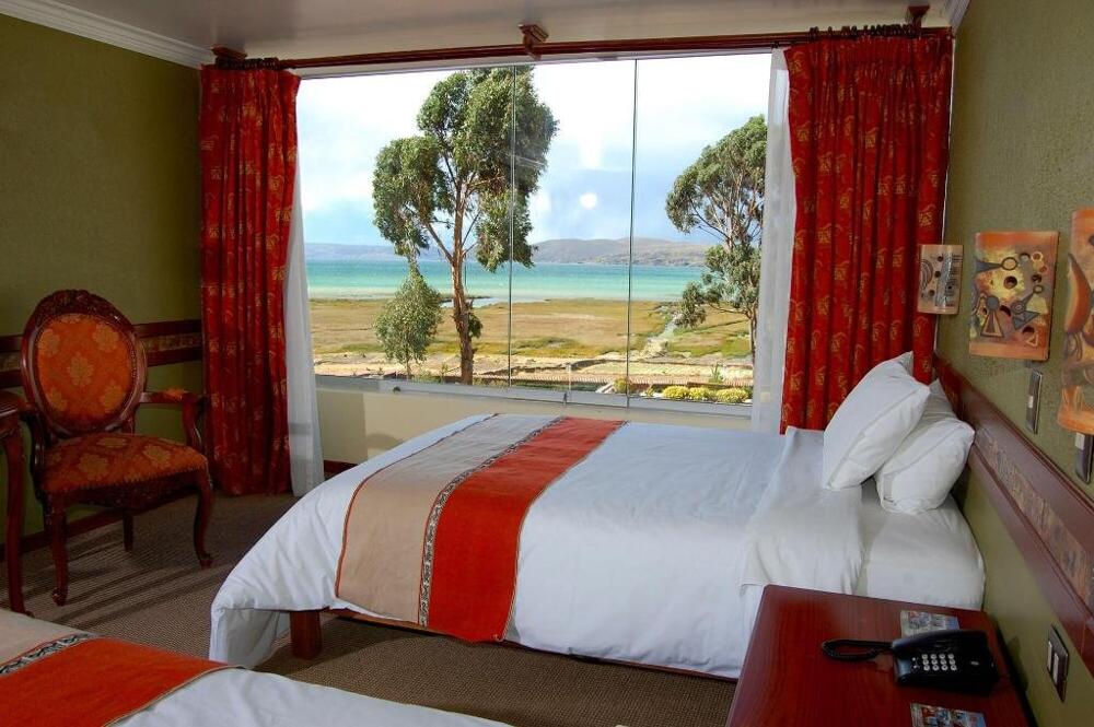 Foto de una habitación de Taypikala Hotel Lago