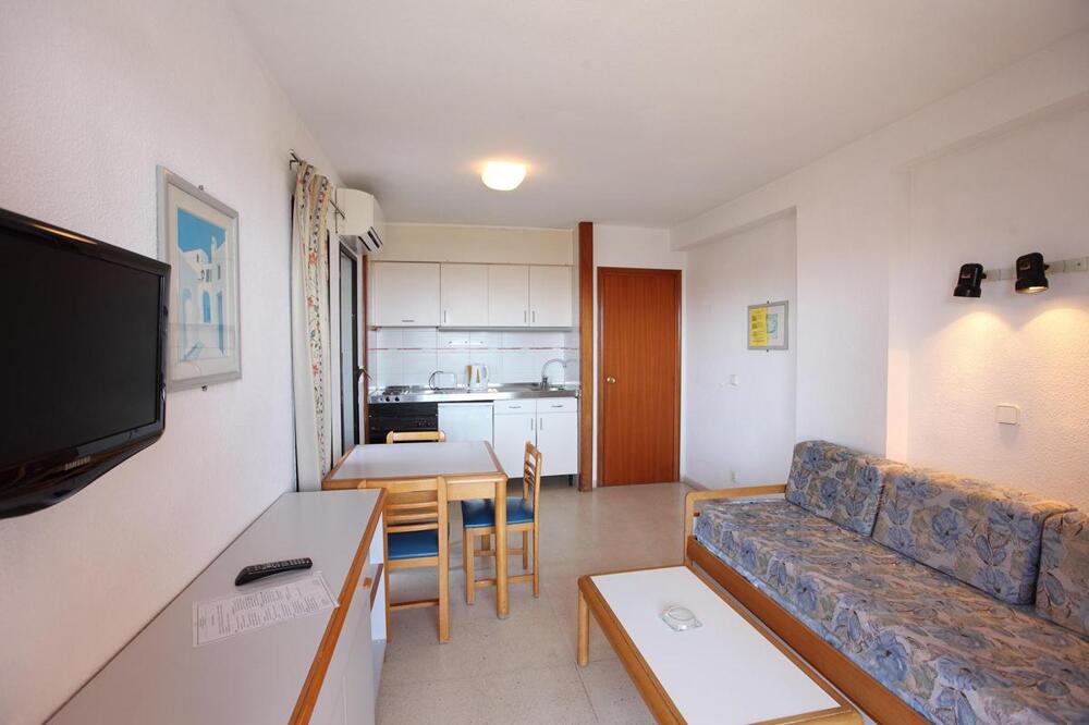 Foto de una habitación de Apartamentos La Caseta - SABESA