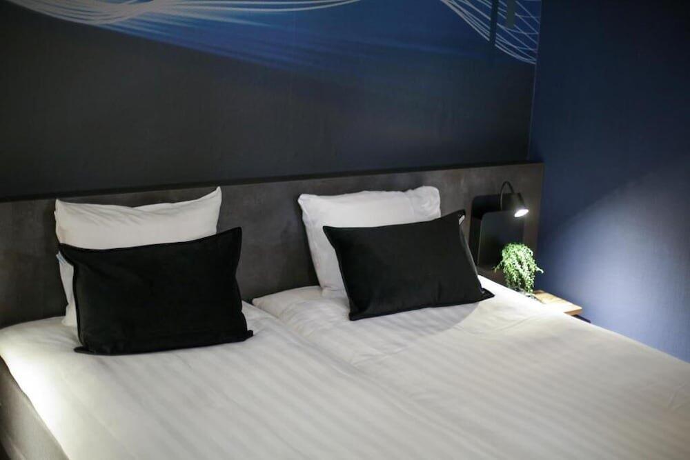 Foto de una habitación de Hotel Heemskerk