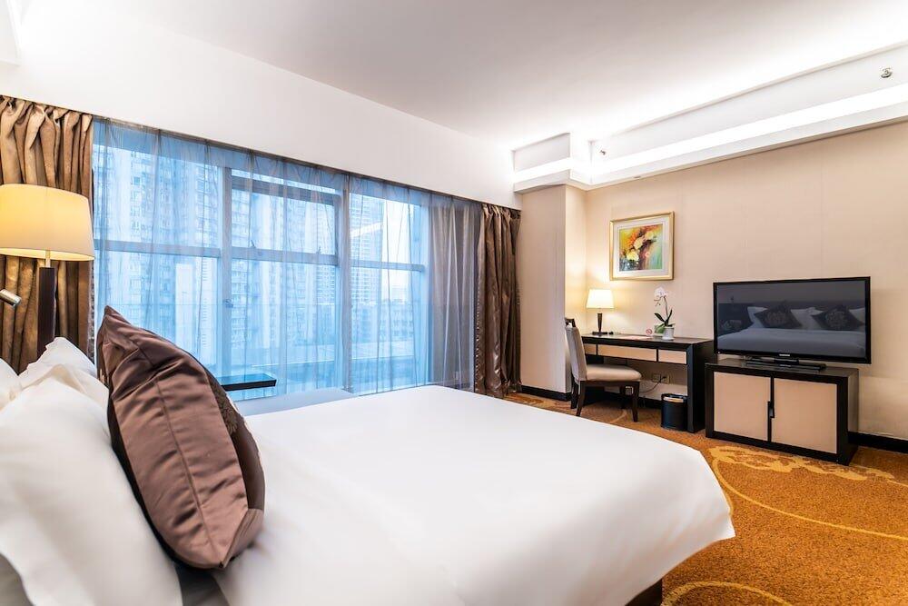 Foto de una habitación de Landmark International Hotel