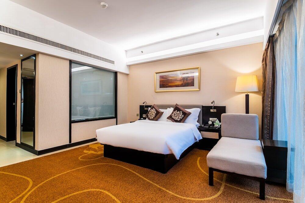 Foto de una habitación de Landmark International Hotel